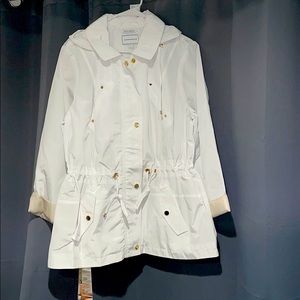 White rain coat never worn